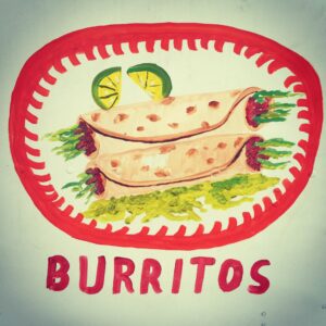 Is that lettuce and tomato sticking out the end? Why aren't they folded burrito-style?